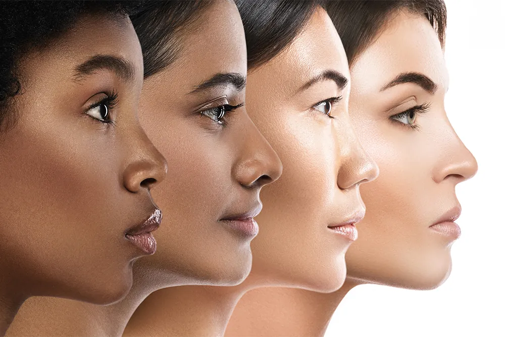 Side profiles of four women showcasing diverse ethnic backgrounds and their unique nose shapes